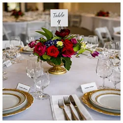 Dining table setting with floral centerpiece